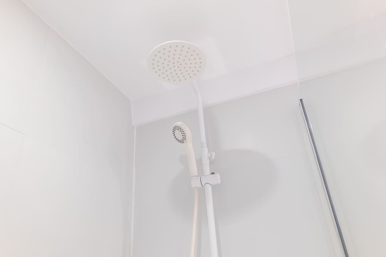 Enjoy a sleek bathroom featuring a spacious rainfall shower.