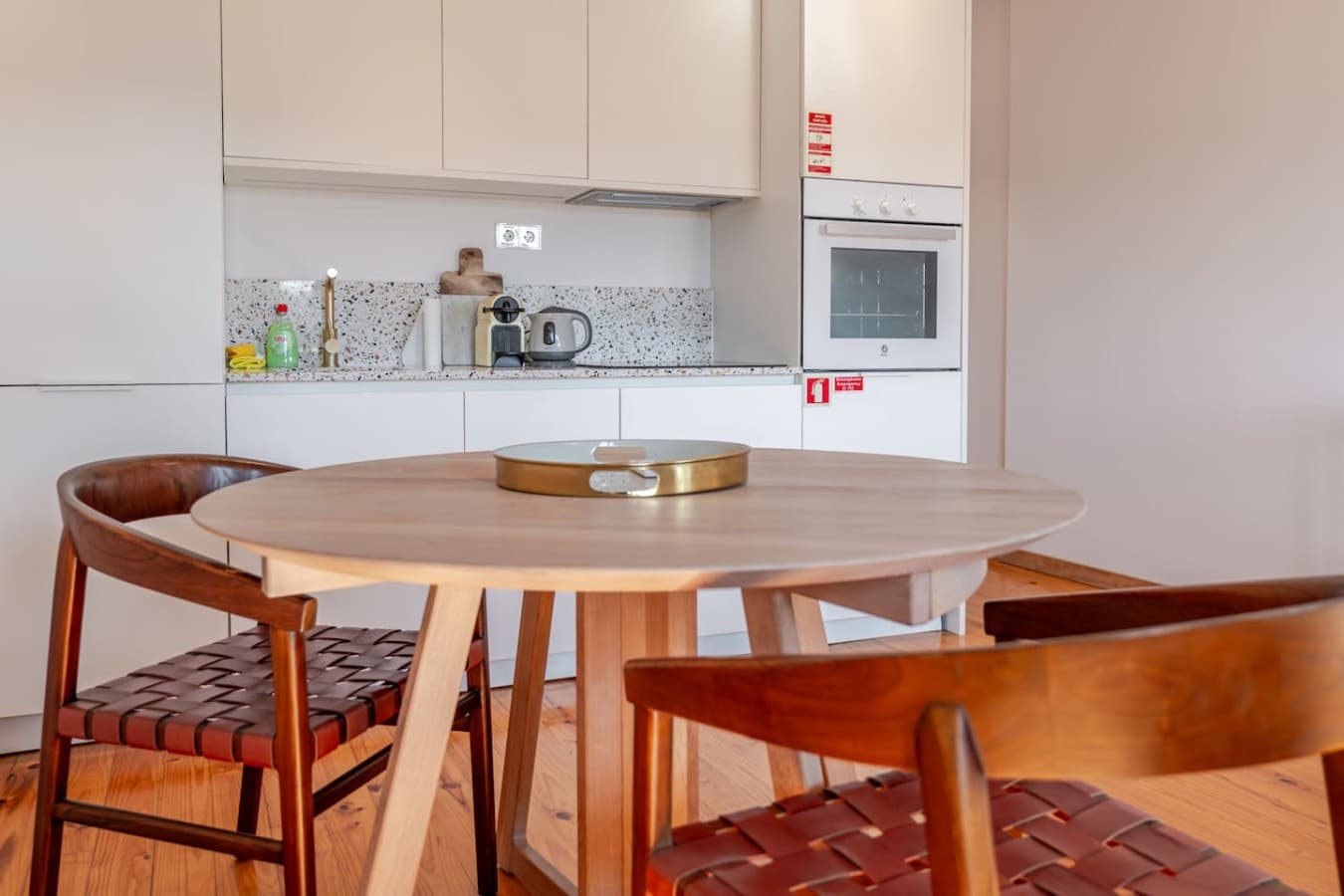 Share meals around the dining table just steps from the fully equipped kitchen.