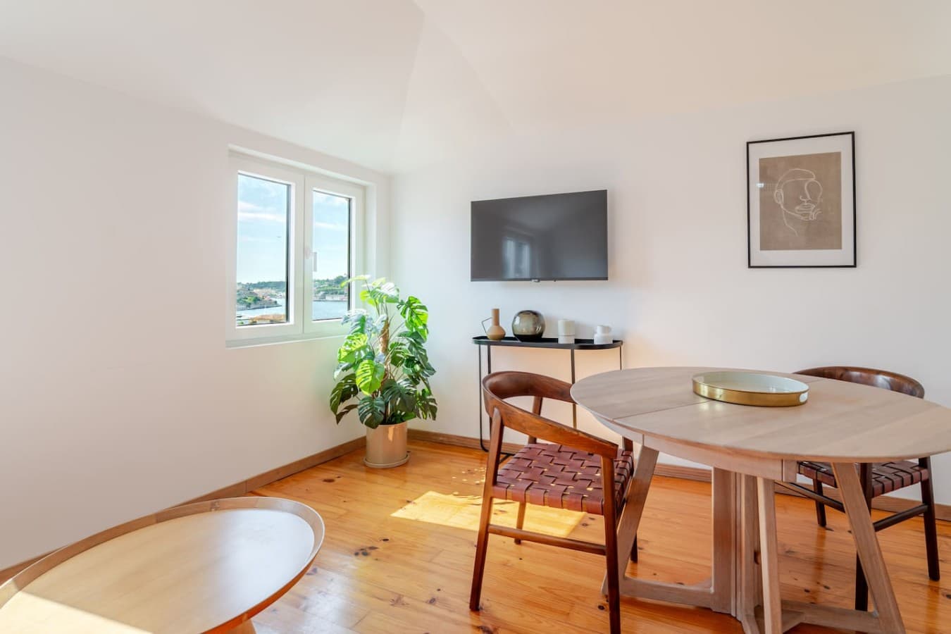 A thoughtfully designed space featuring modern décor and refreshing greenery.