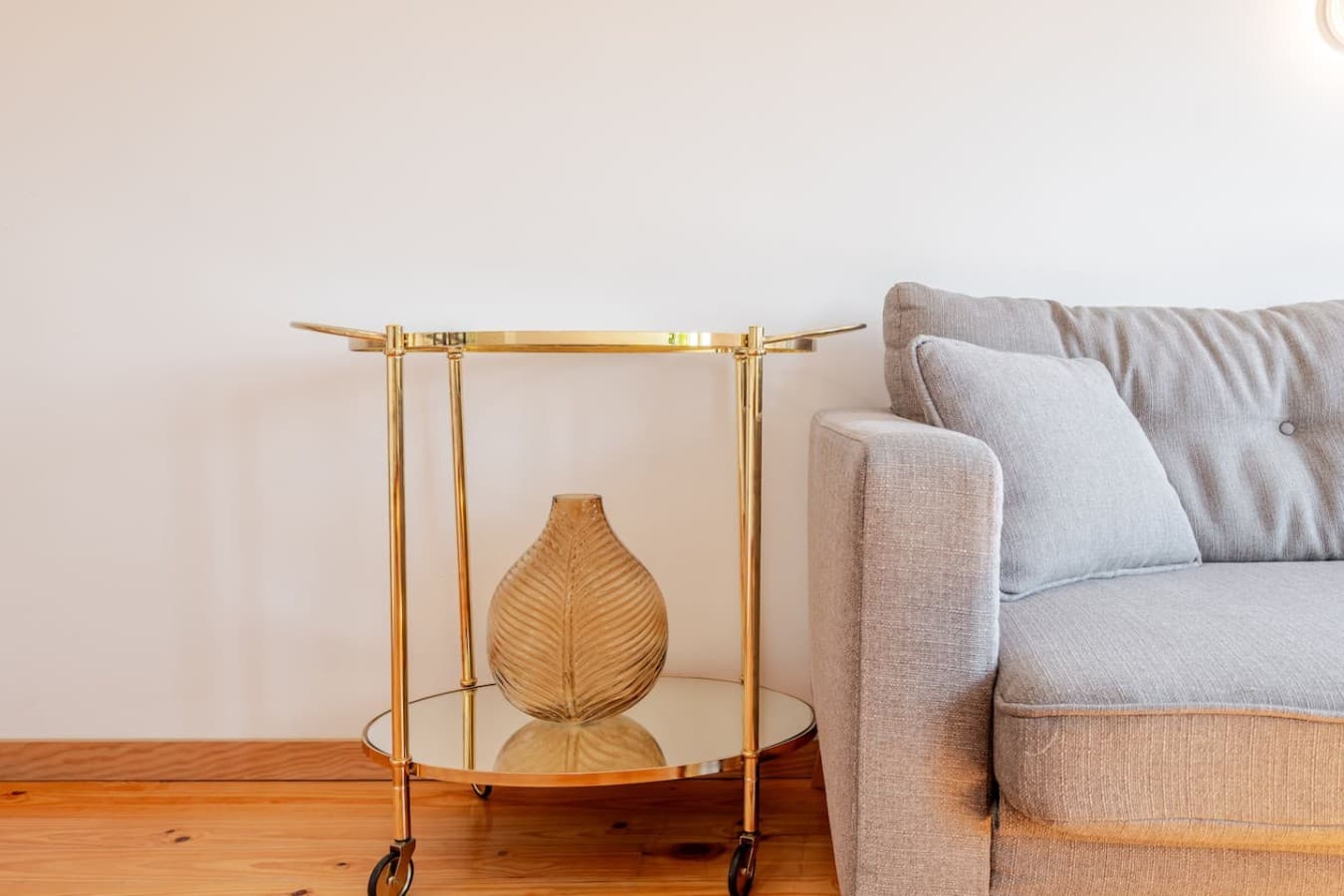 A thoughtfully placed side table keeps your coffee, or essentials within easy reach.