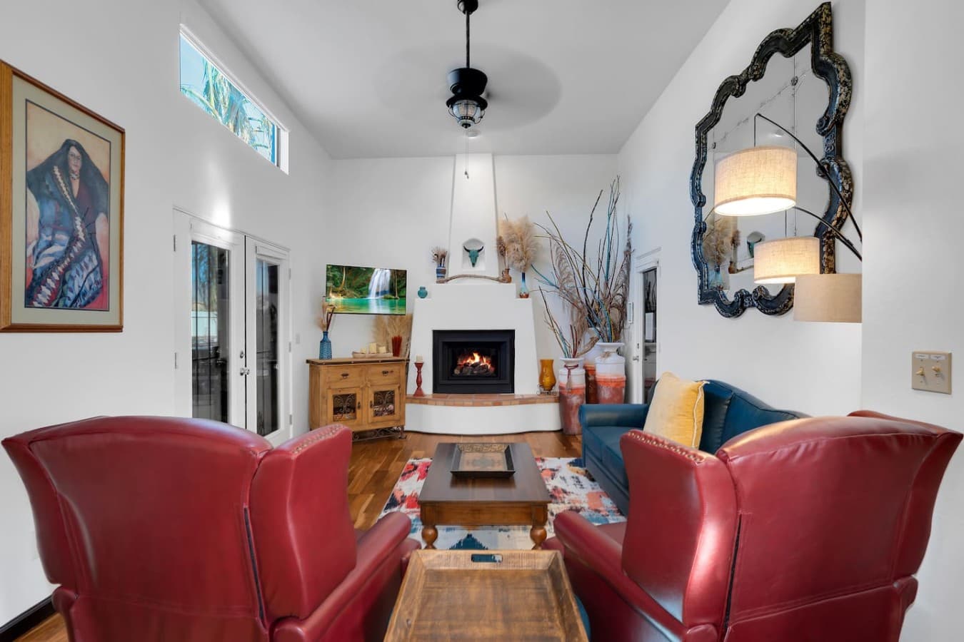 Cozy living room centered around a charming fireplace and inviting layout.