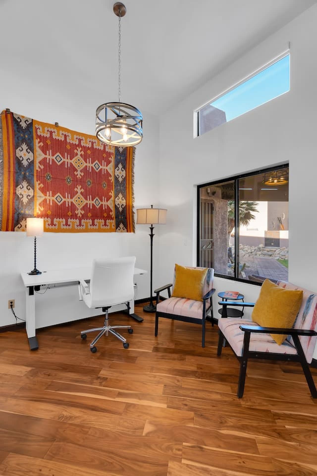 Dedicated workspace with natural light and vibrant Southwestern accents.