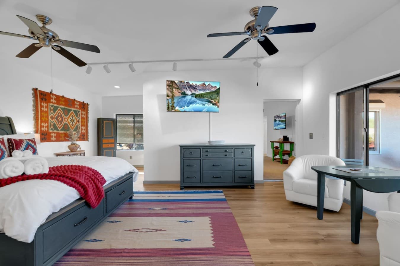 Wide bedroom layout with ample space to unwind and feel at home.