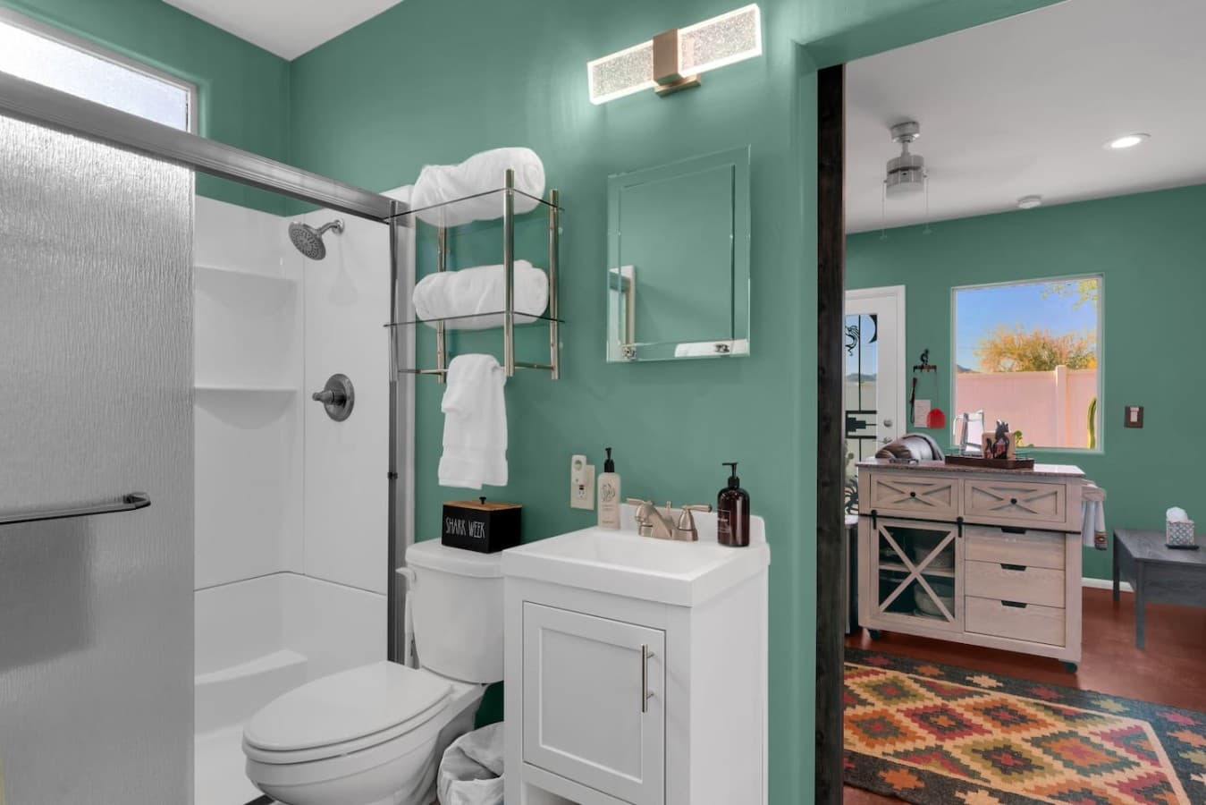 Moon Dance Casita; Private attached guest unit bathroom with modern vanity and clean design.