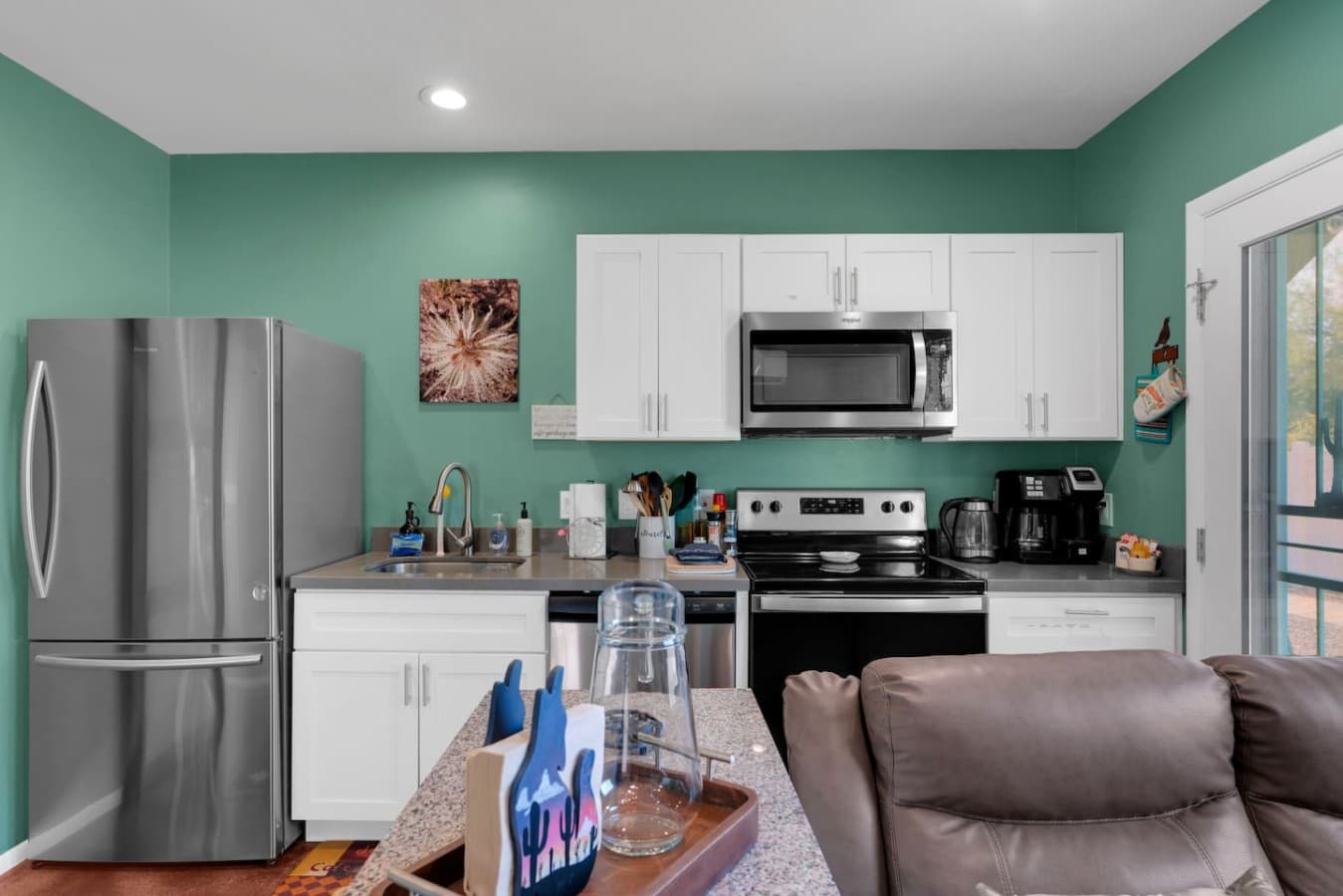 Moon Dance Casita; Cozy attached guest unit kitchen and living space for a relaxing stay.