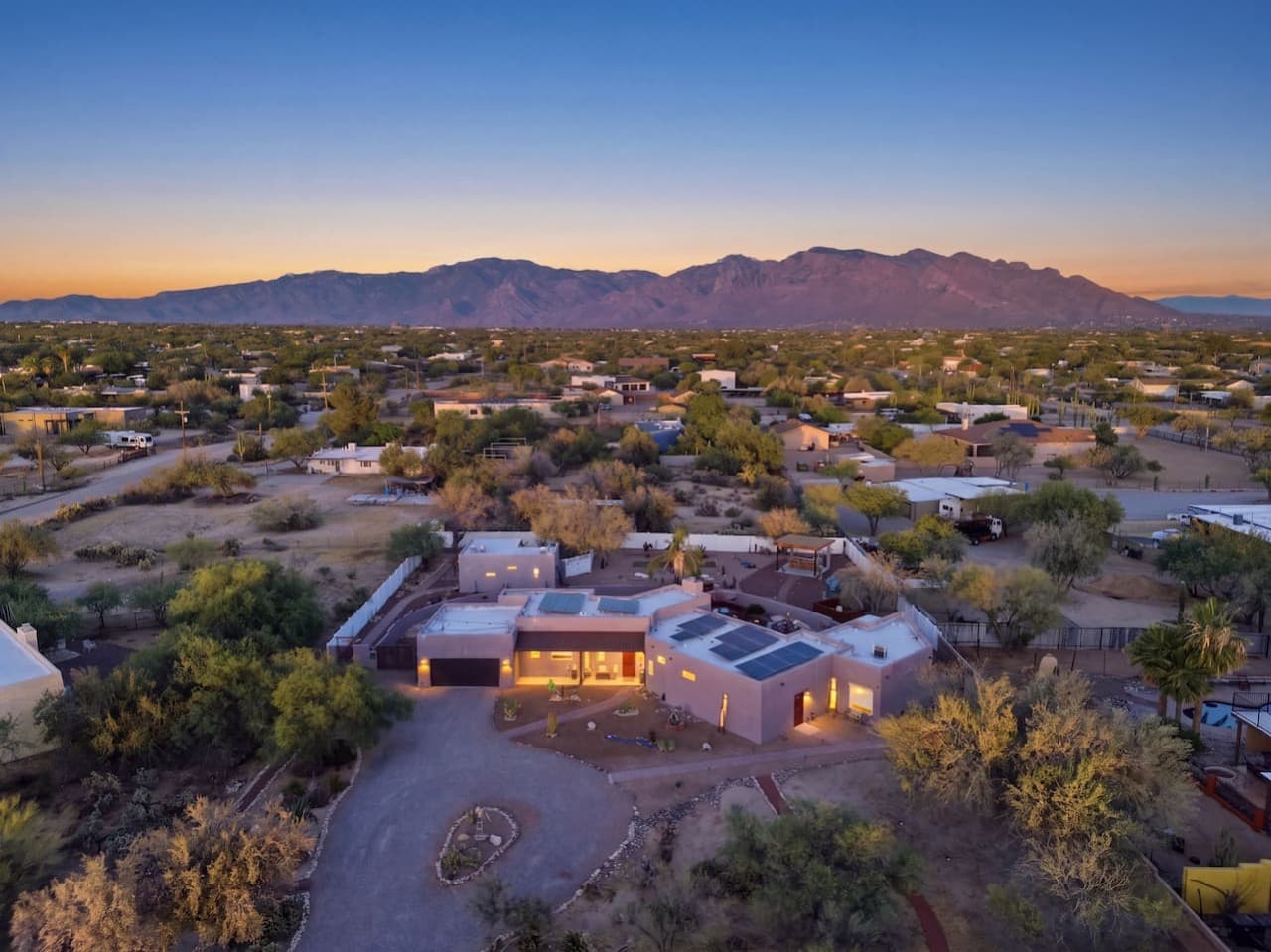 Aerial view showcasing the property and surrounding mountain views.