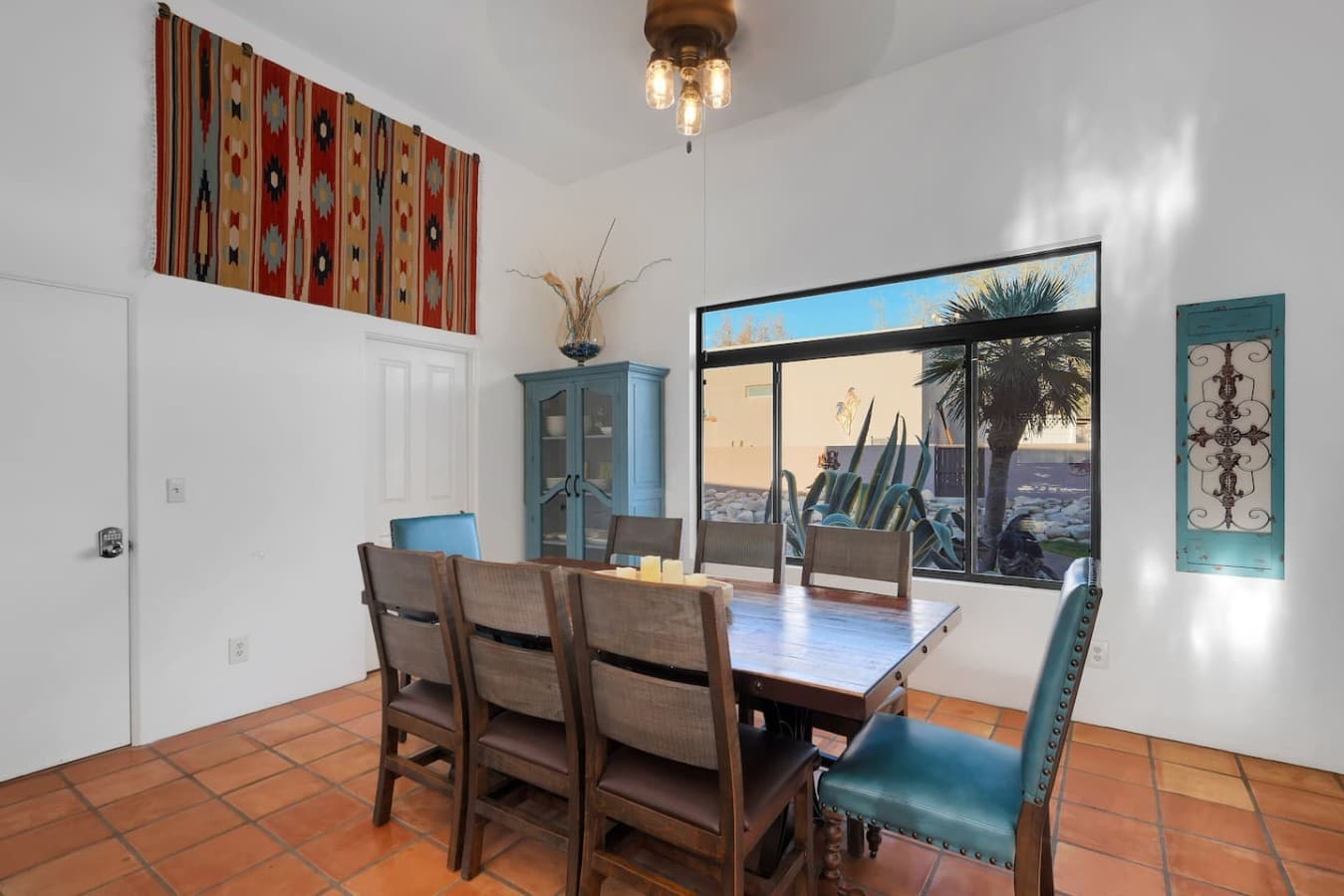 Spacious dining area with seating for everyone and vibrant decor.