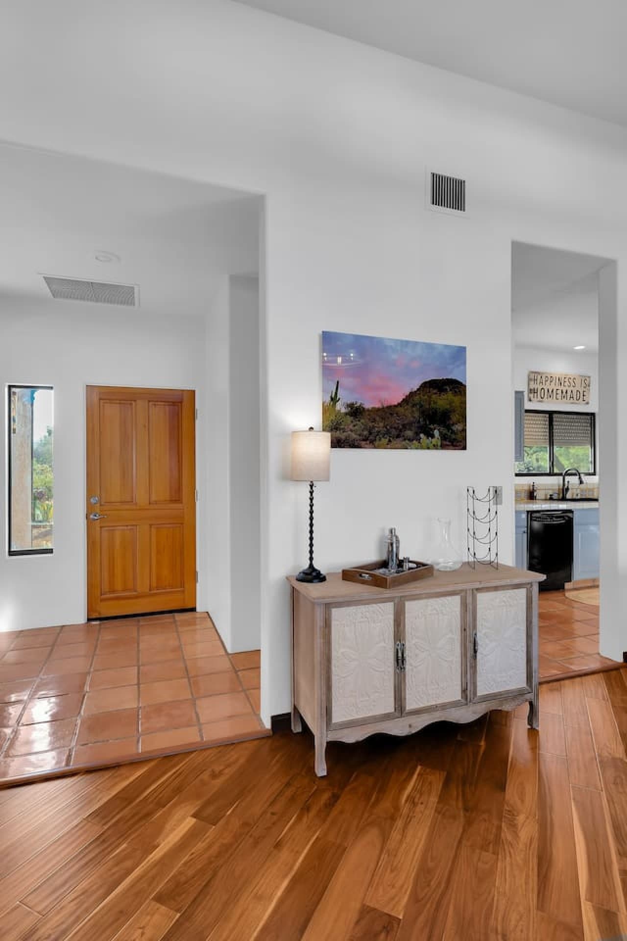 Welcoming entryway with tasteful decor and easy access to main living areas.