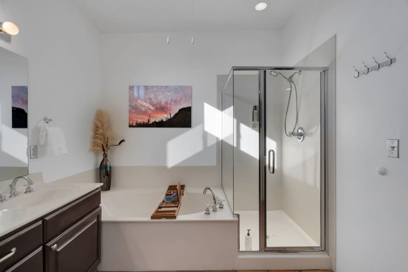 Soaking tub and glass shower for a spa like experience.