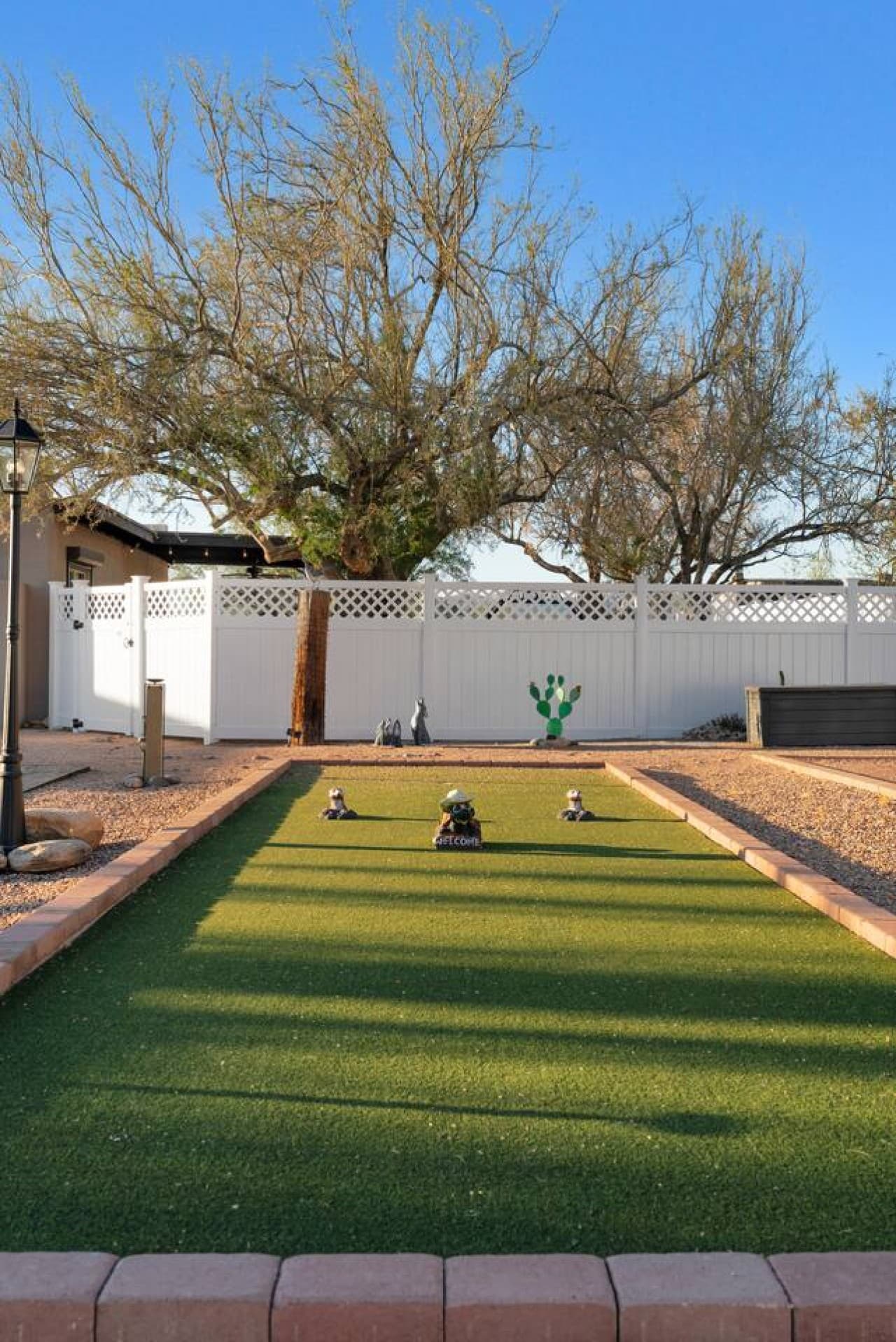 Turf area perfect for outdoor games and friendly competition.