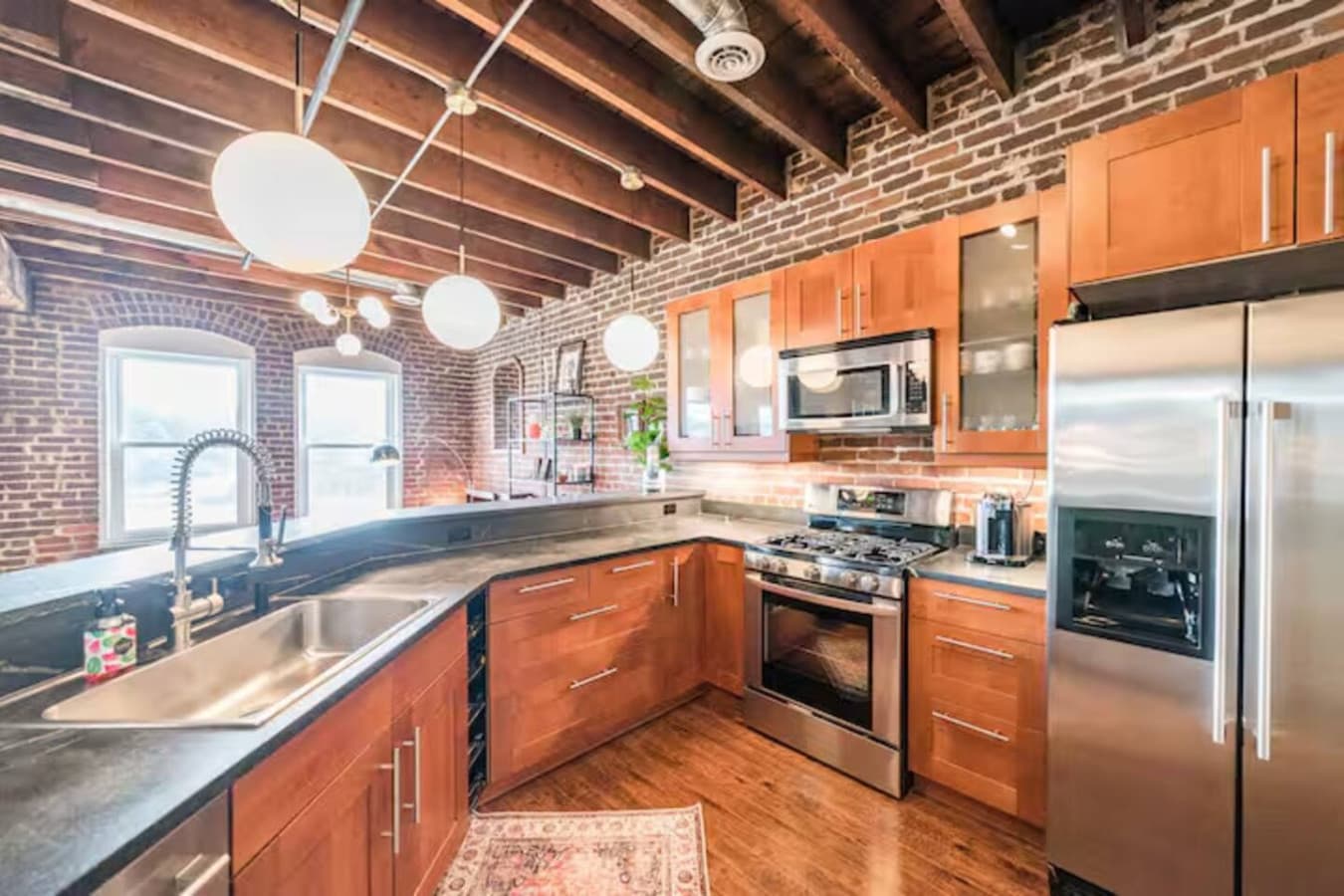Corner kitchen layout with ample counter space and natural light.