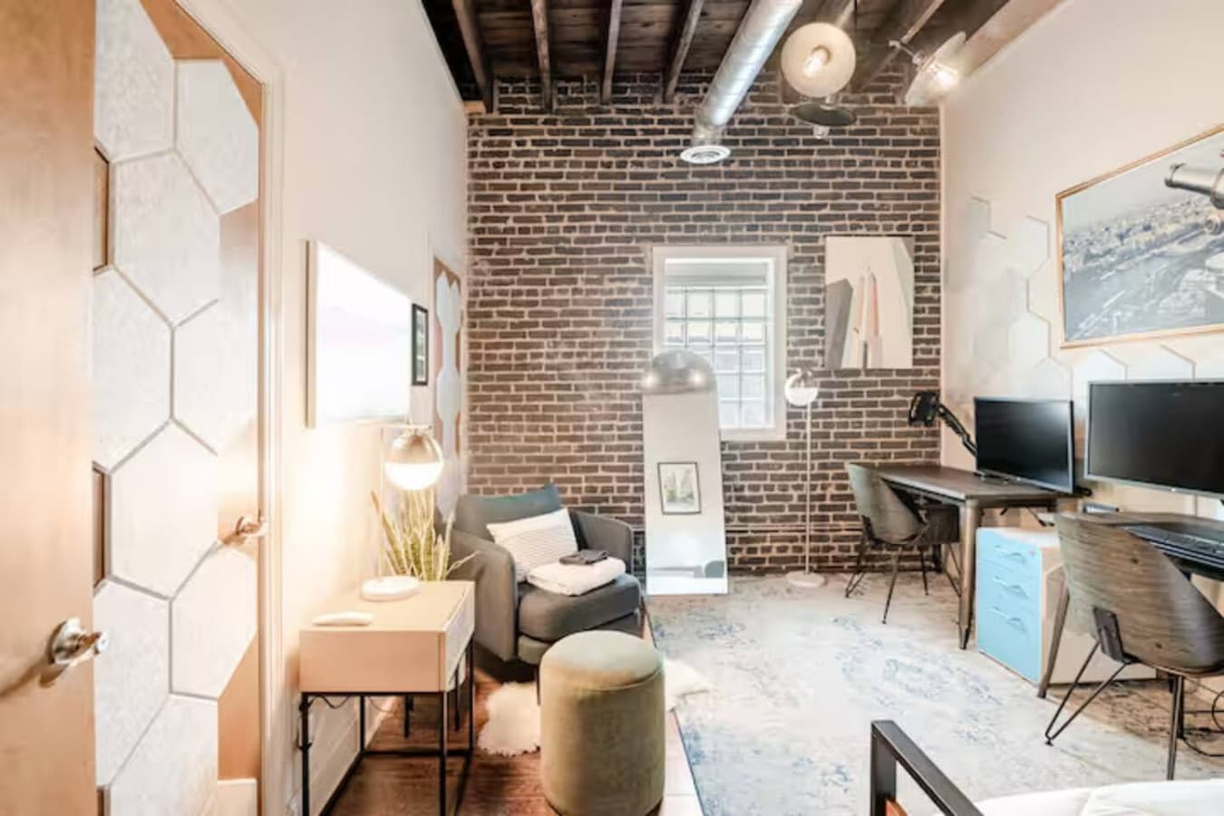 Bright office nook with comfortable seating and natural light.