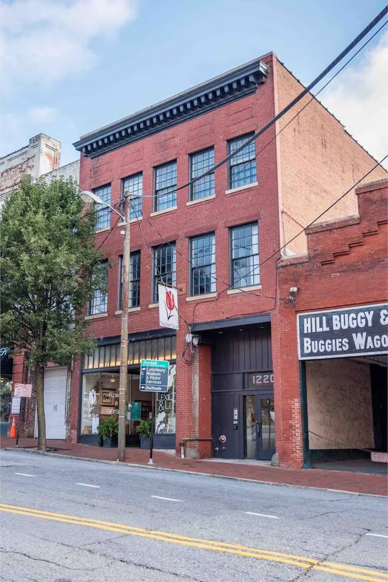 Historic brick building located in a vibrant neighborhood.