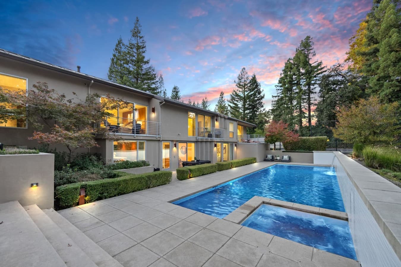 Spacious poolside terrace with a spa area, perfect for relaxing, entertaining, and enjoying sunny afternoons.