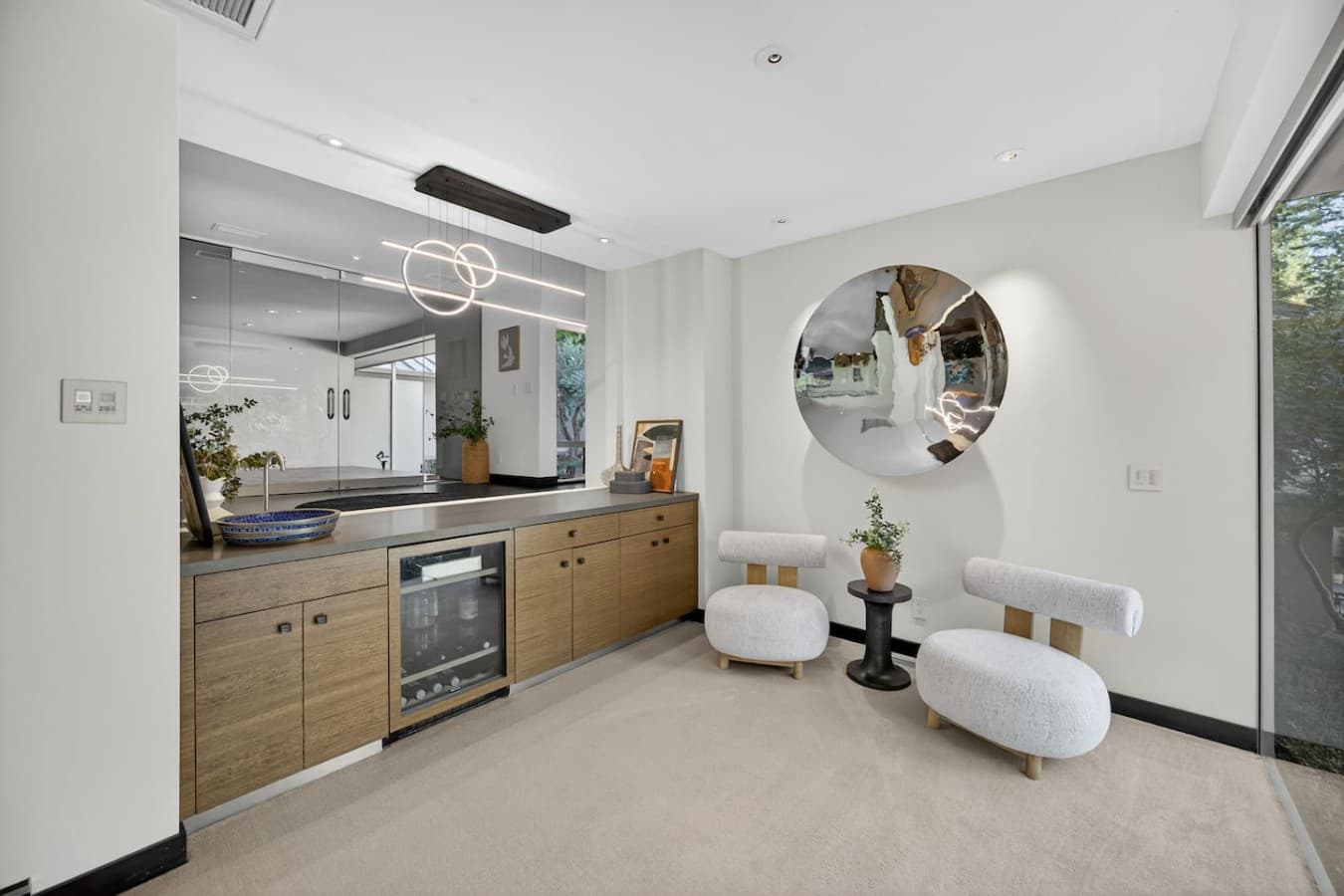 Comfortable upper level lounge with a built in beverage station, perfect for relaxing between adventures.