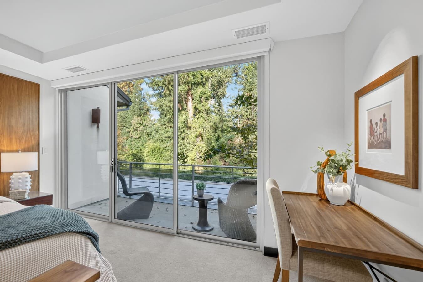 Private balcony access invites you to enjoy fresh air and tranquil treetop views from the comfort of your suite.