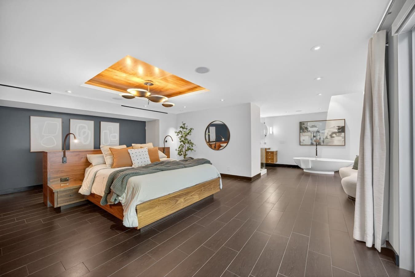 Spacious bedroom sanctuary with room to unwind, complemented by warm finishes and a luxurious ensuite.
