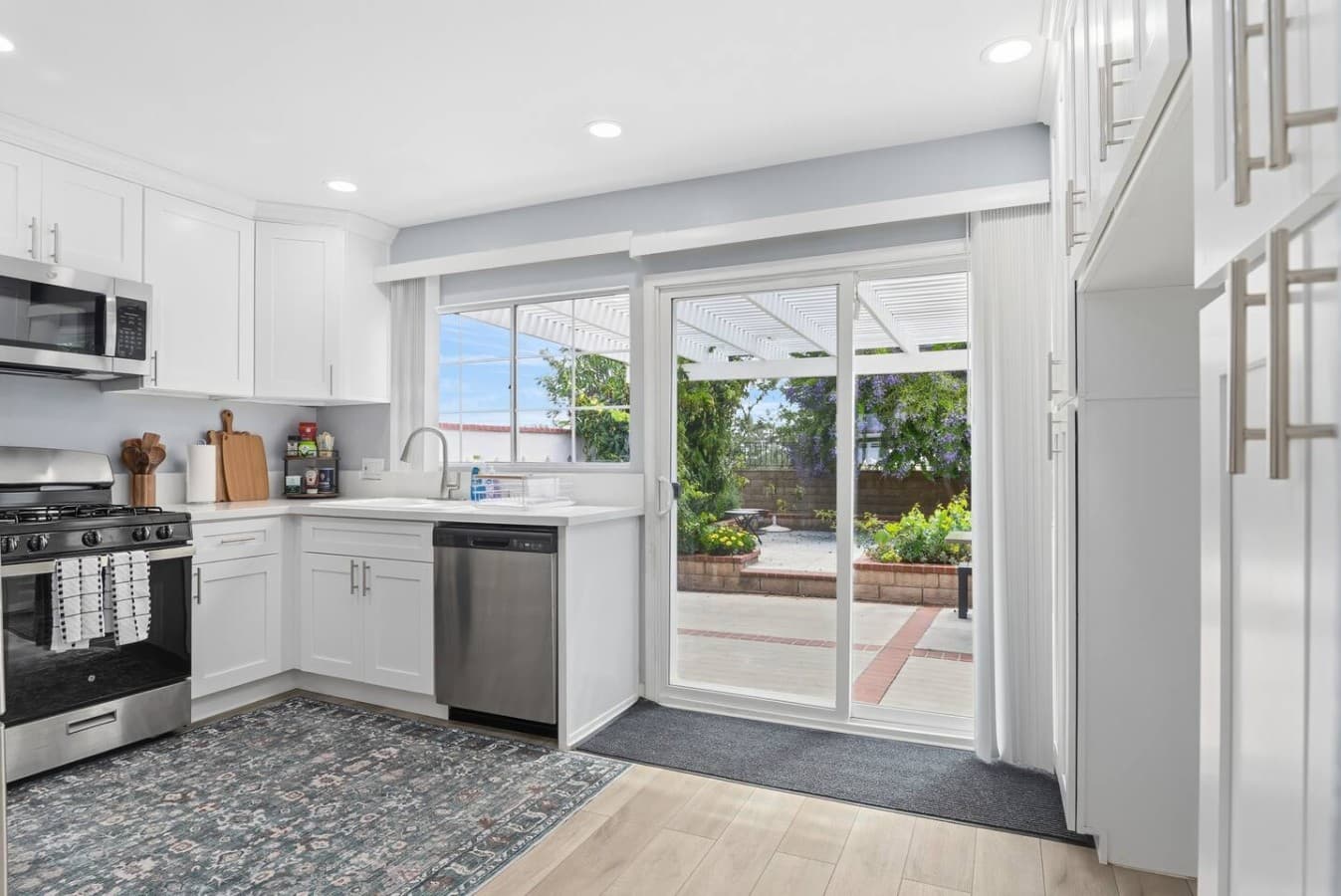 Bright kitchen with direct access to the backyard patio.