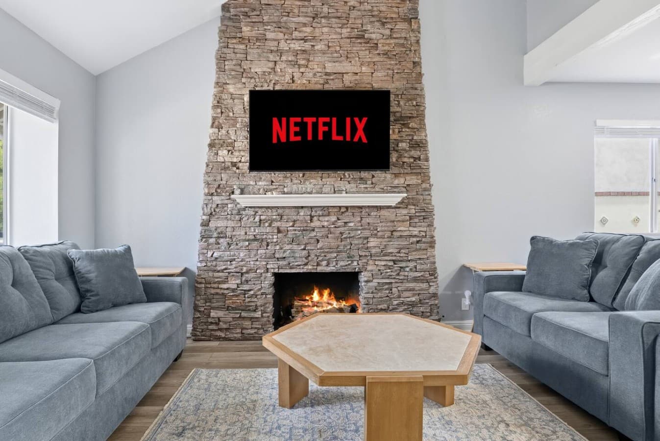 Cozy fireplace feature with a smart TV for relaxing nights in.