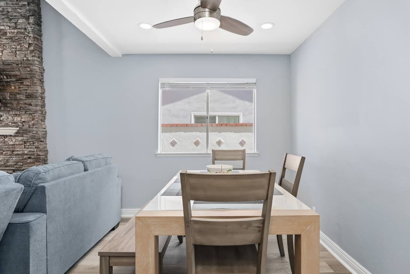 Bright dining space connected to the living room and kitchen.