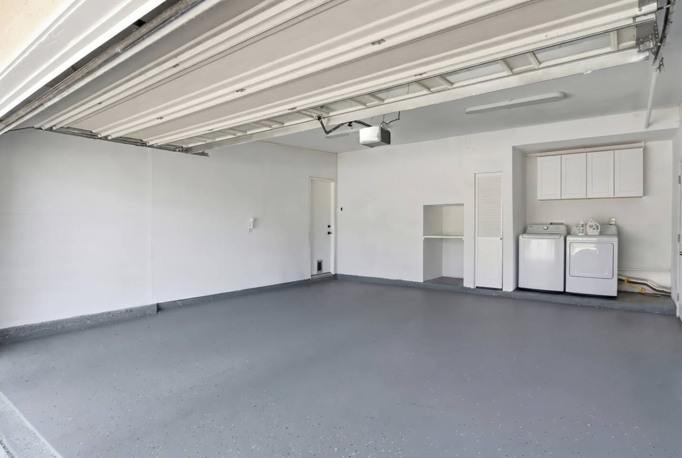 Spacious two car garage with plenty of room for parking and storage.