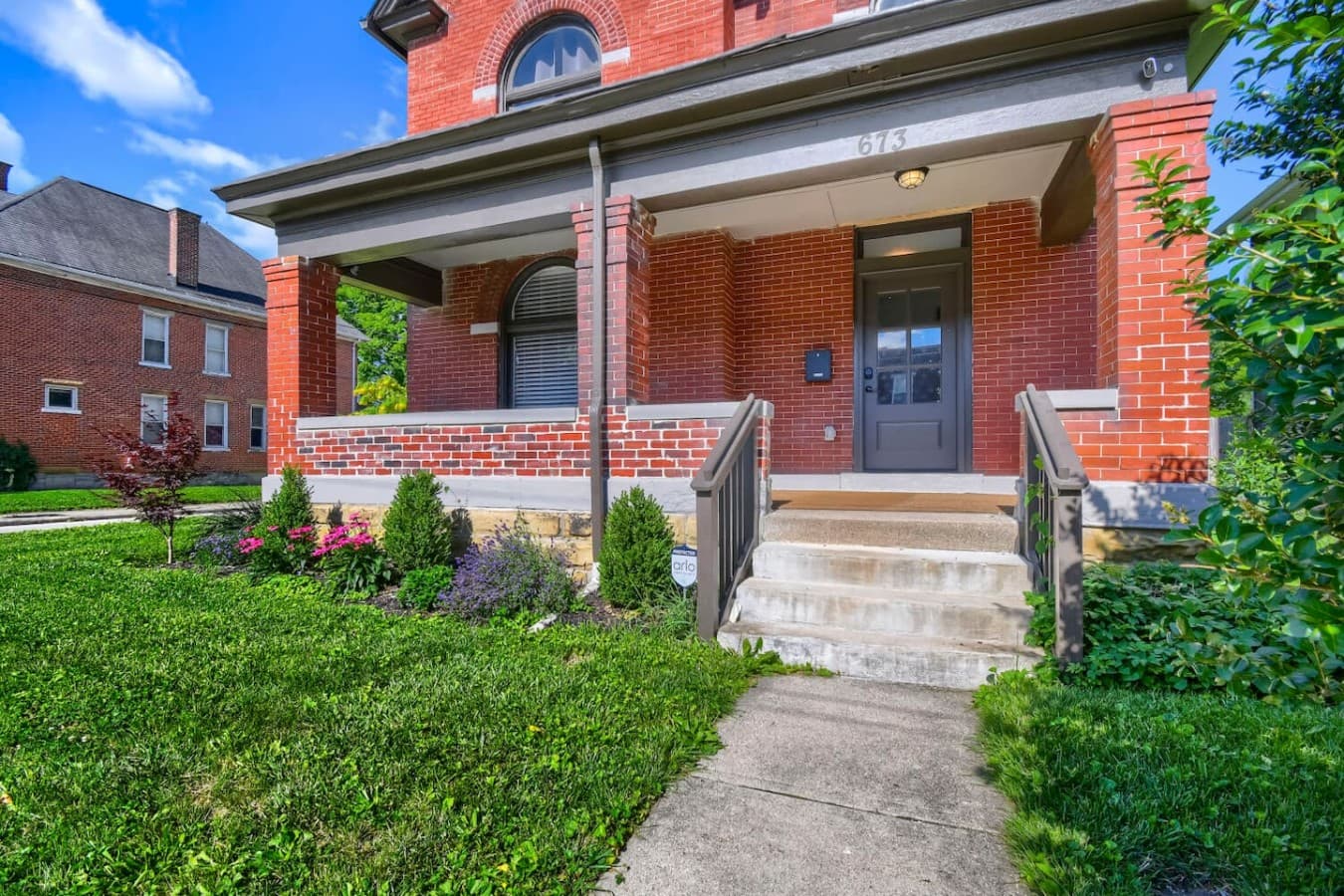 Arrive with ease at the inviting front entrance featuring a spacious covered porch and charming curb appeal.