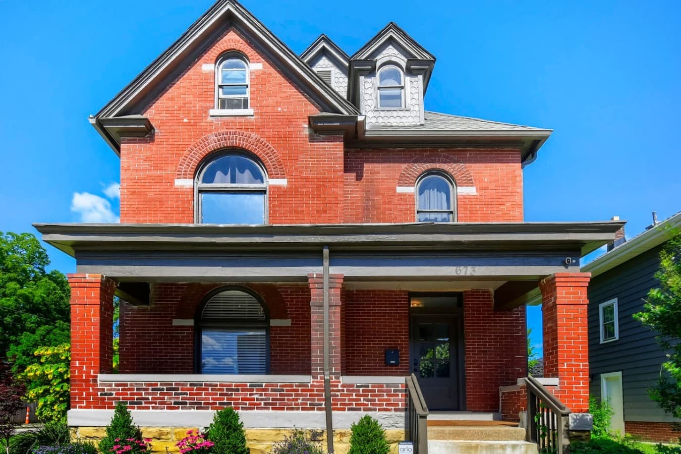 Historic brick home with beautiful curb appeal combining classic character and modern updates.