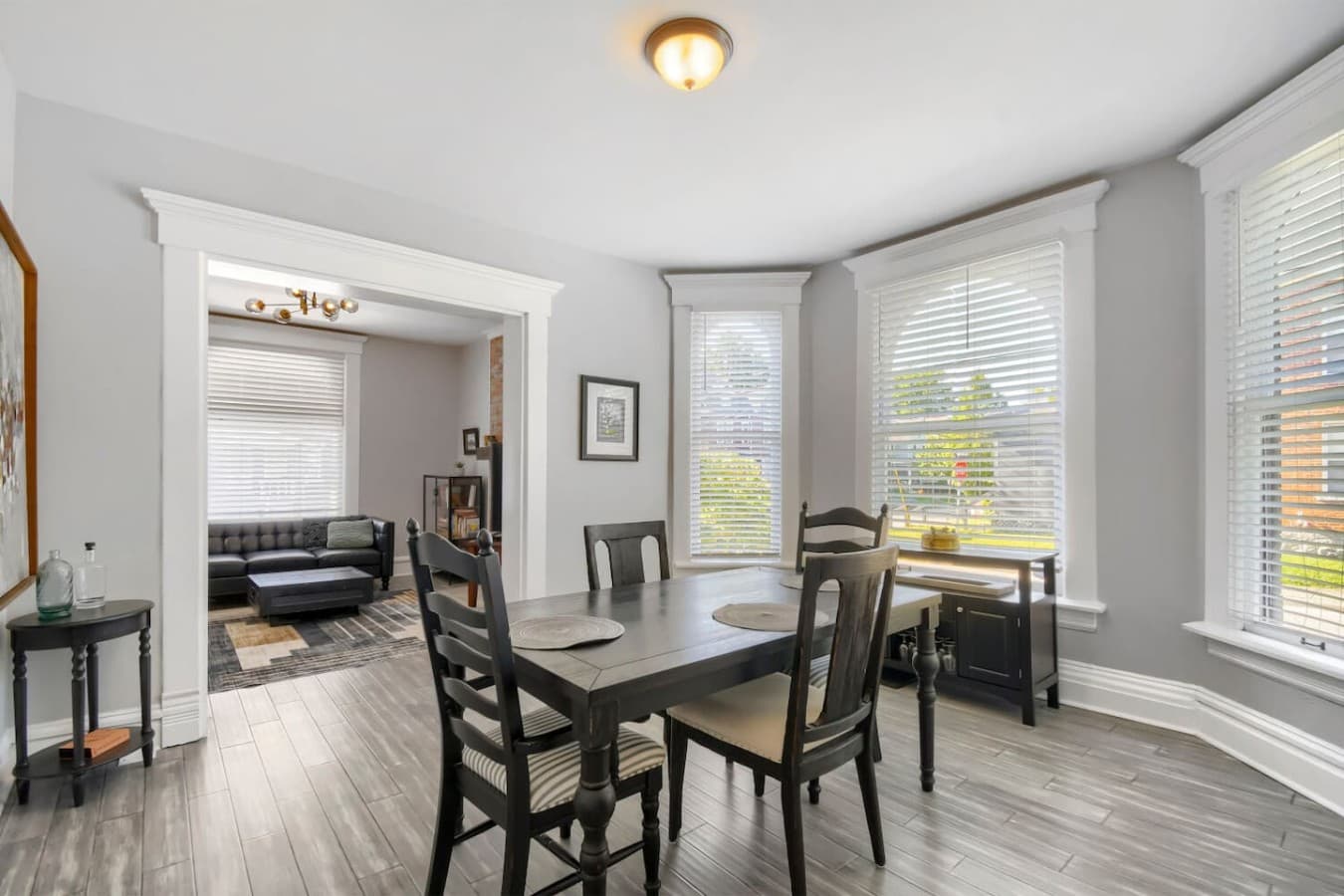 Bright dining area with large windows and an open layout perfect for family meals and conversation.