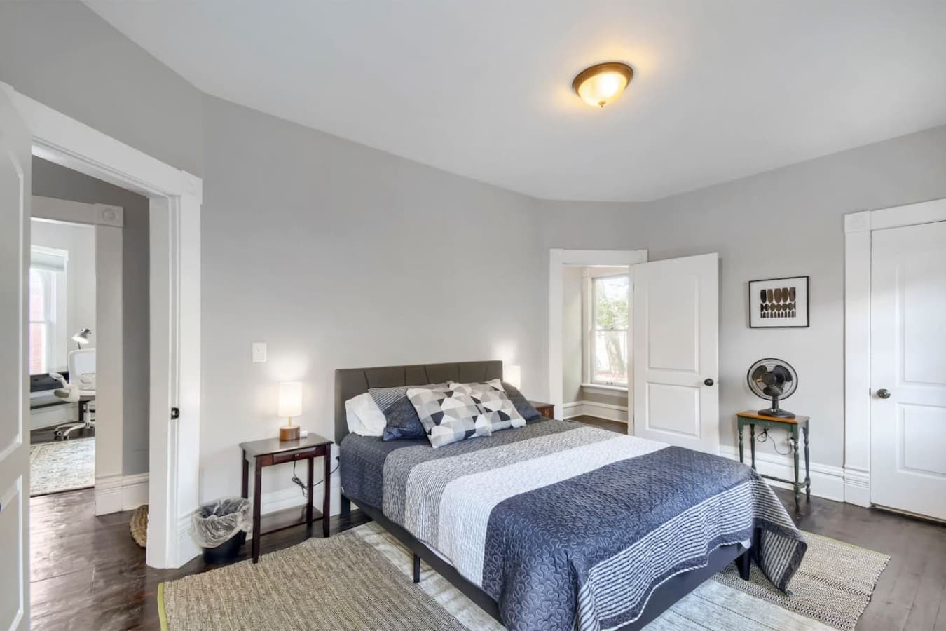 Unwind in this inviting bedroom designed with cozy décor, soft lighting, and a calm, comfortable setting.