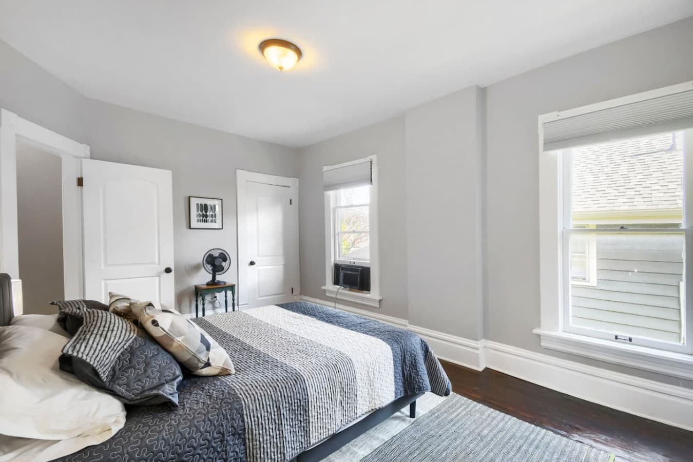 Bright and spacious bedroom featuring a comfortable bed and peaceful atmosphere for restful nights.