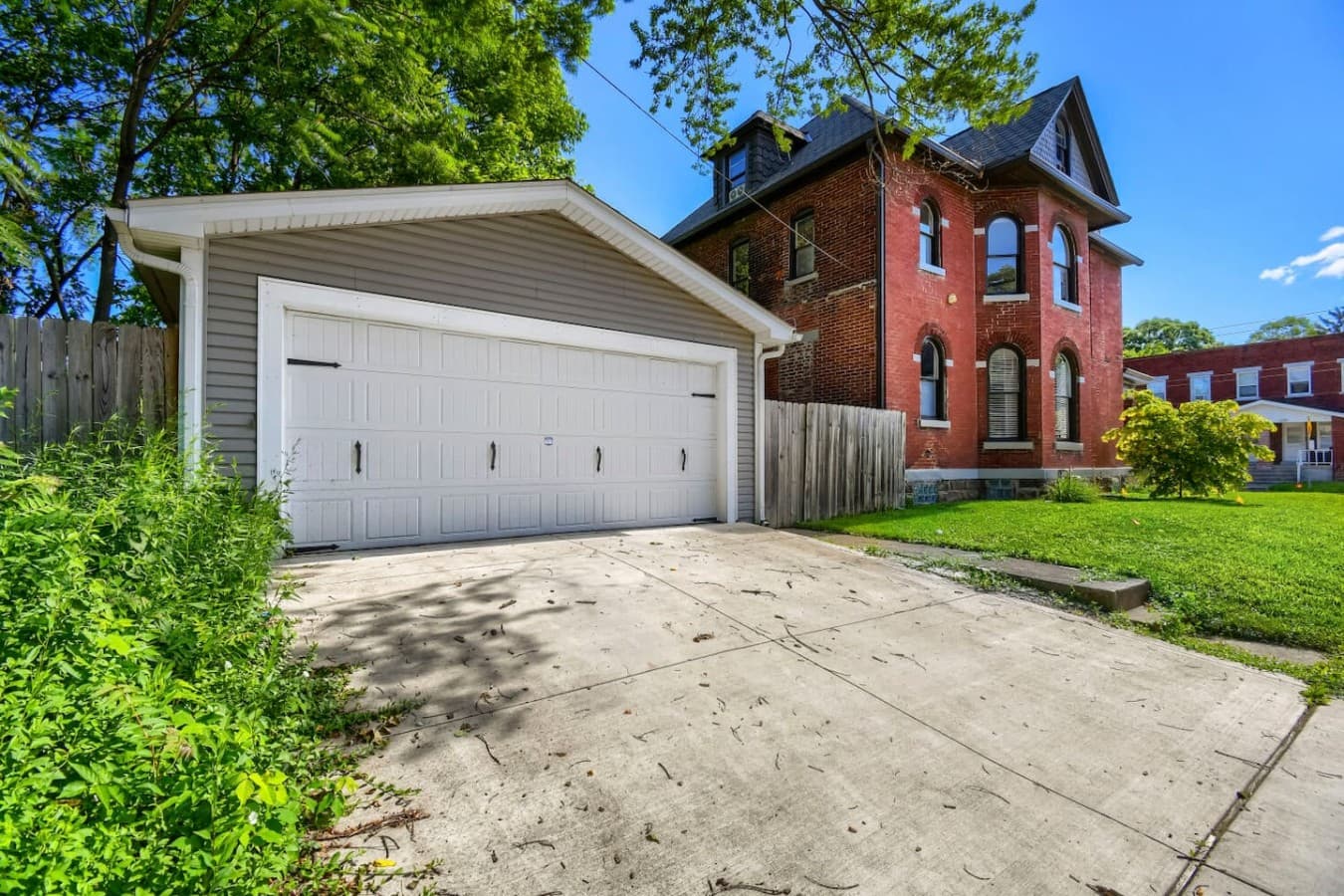 Free off street parking with a spacious detached garage and private driveway for added convenience.