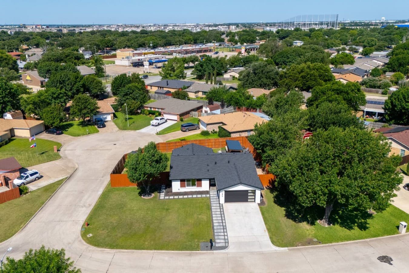 Aerial view showcasing the property’s generous lot size, private backyard, and convenient neighborhood location.