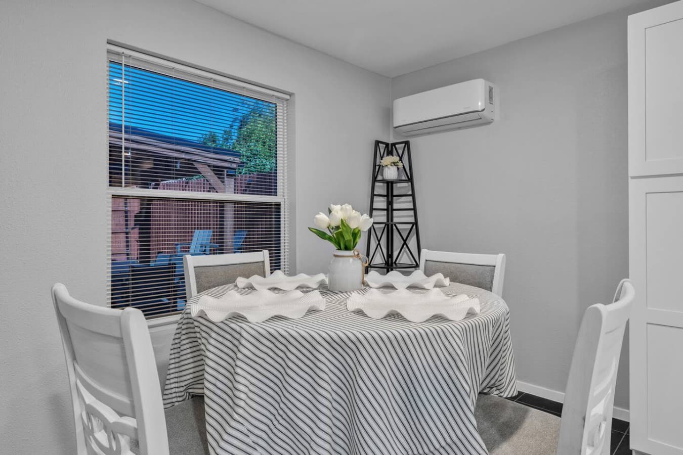 Bright dining area with comfortable seating and a welcoming space to enjoy meals together.