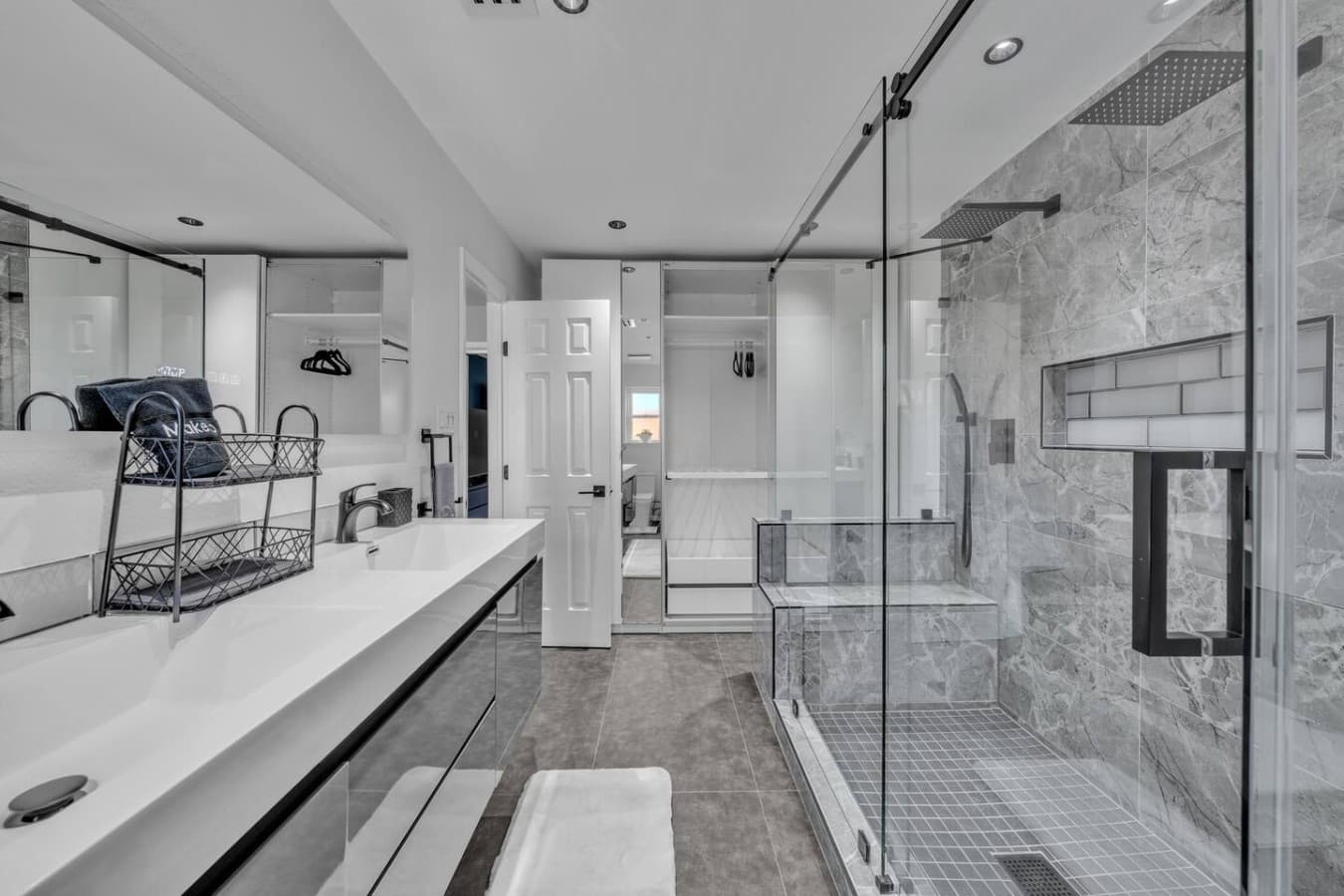 Beautifully designed bathroom offering premium finishes, ample space, and a resort style experience.