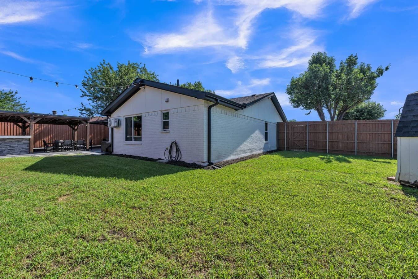 Expansive corner lot with a large yard offering plenty of room to relax, play, and enjoy the outdoors.