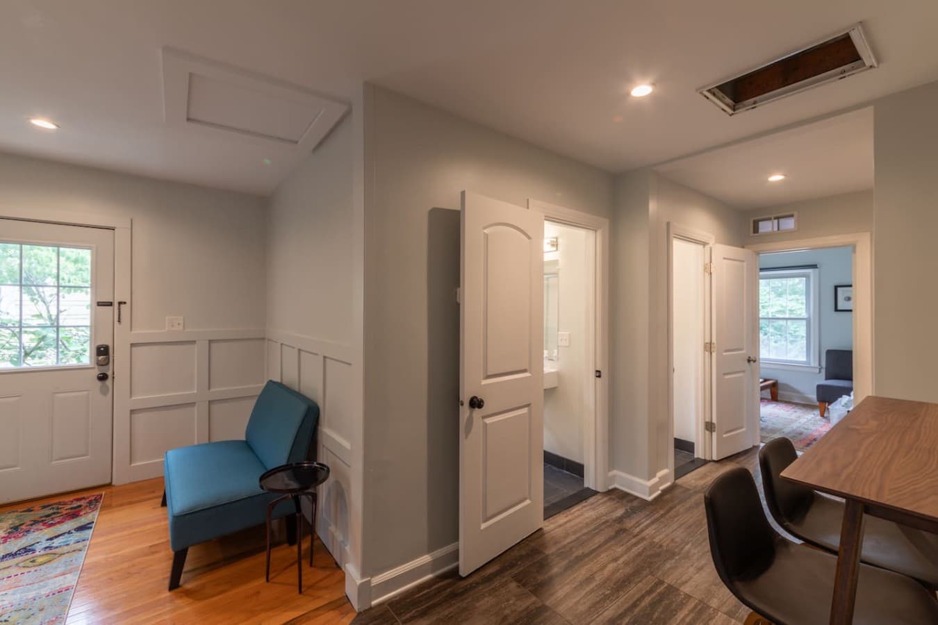 Central hallway connecting the bedrooms, bathroom, and living spaces.