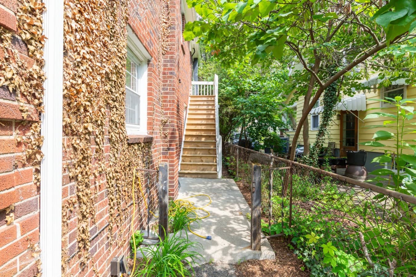 Tree lined walkway leading to your private entrance.