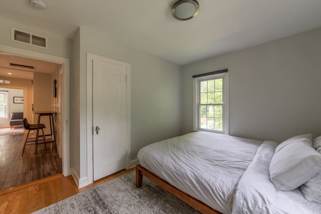 Bright and inviting bedroom designed for a restful stay.