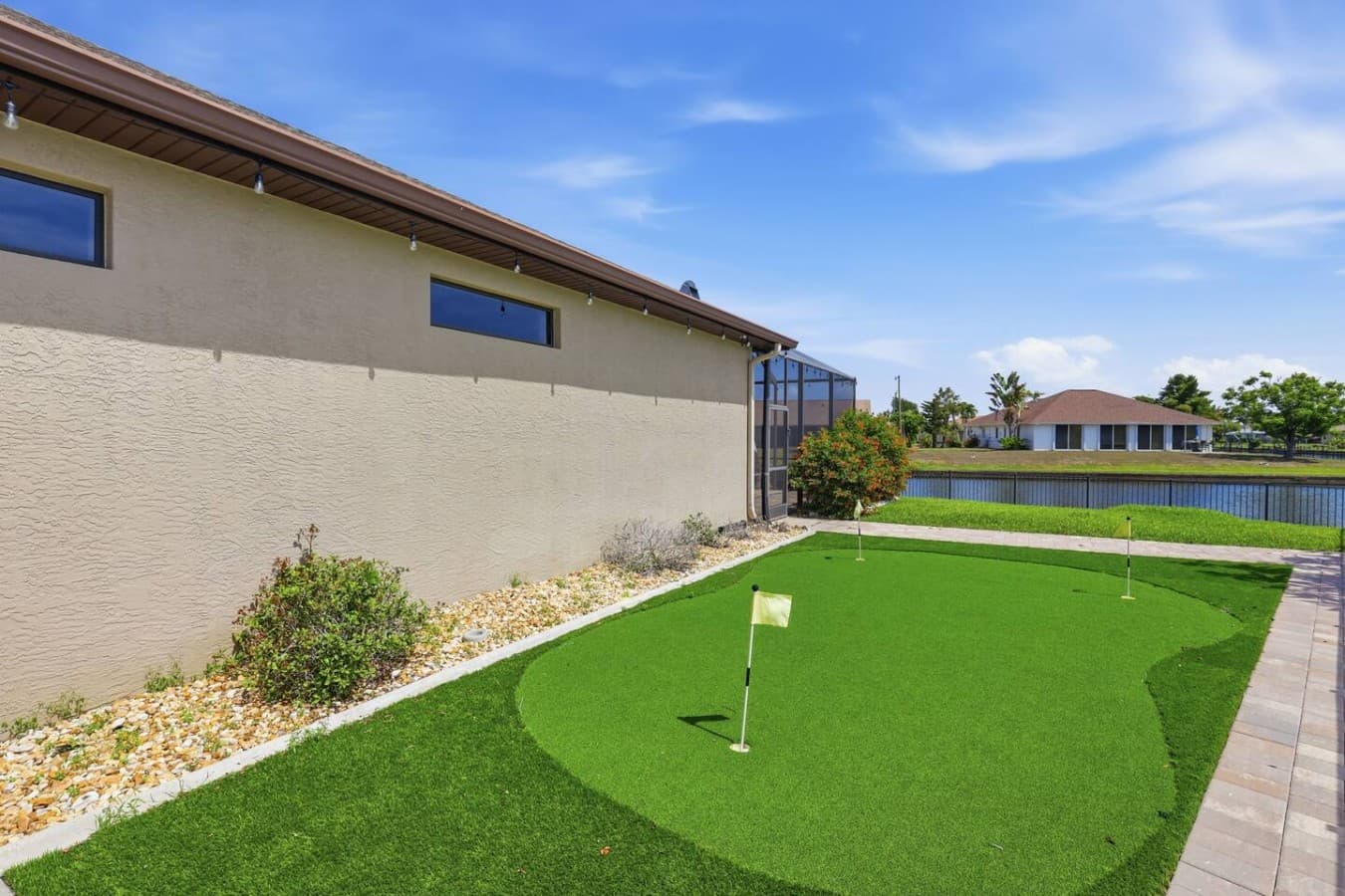 Backyard putting green for friendly games and outdoor fun during your stay.