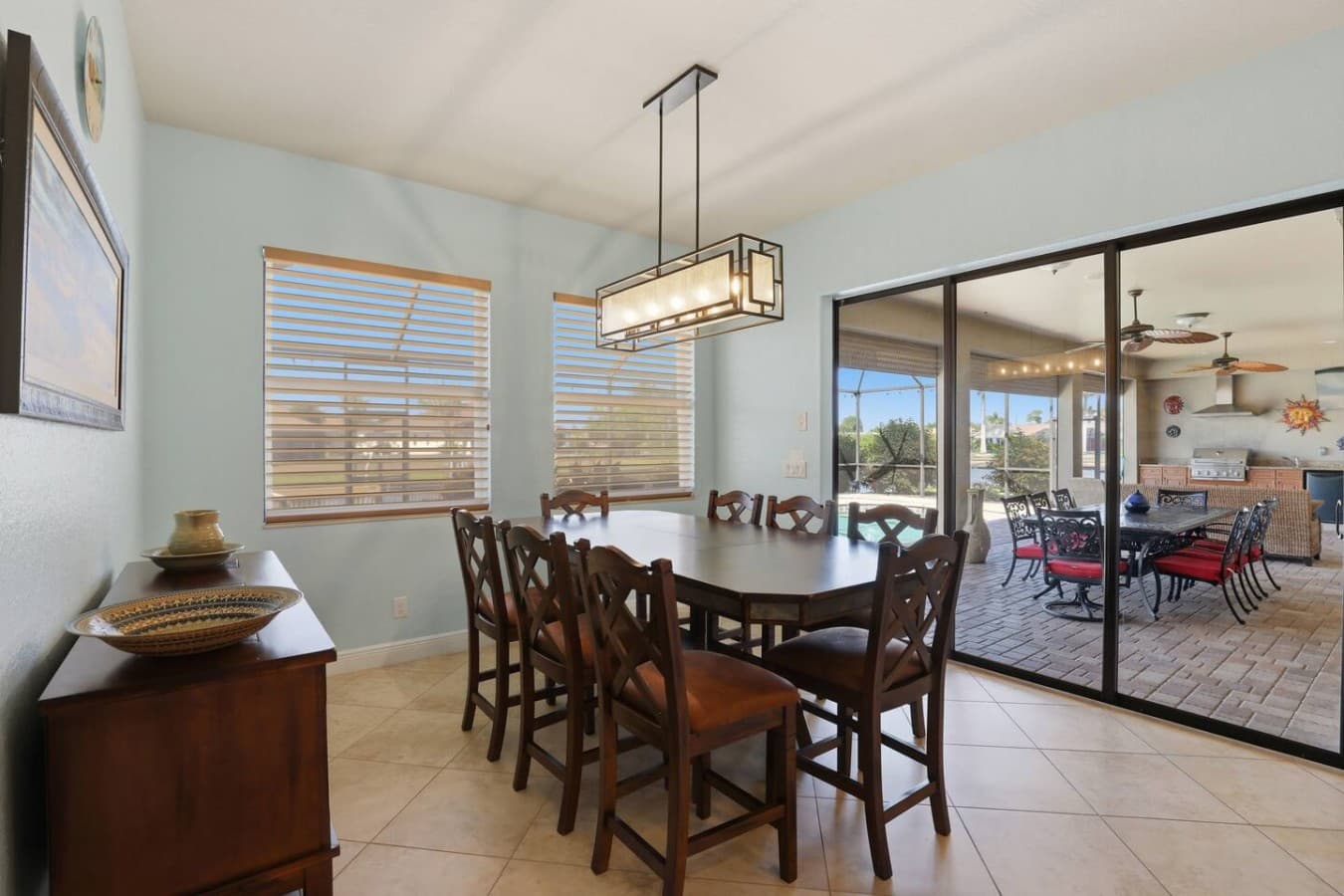 Formal dining area with seating for shared meals and easy patio access.