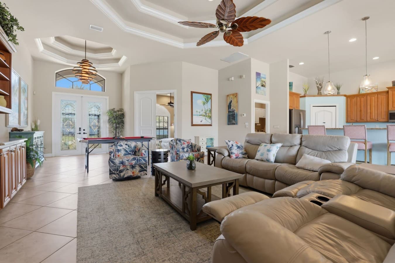 Large gathering space with direct views into the game area and kitchen.