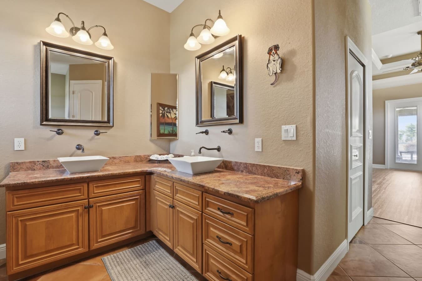 Double vanity bathroom with plenty of counter space and storage.