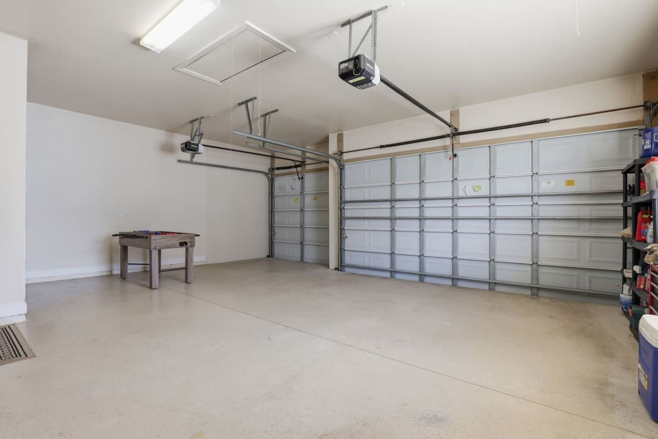 Spacious garage with plenty of room for parking and additional storage.