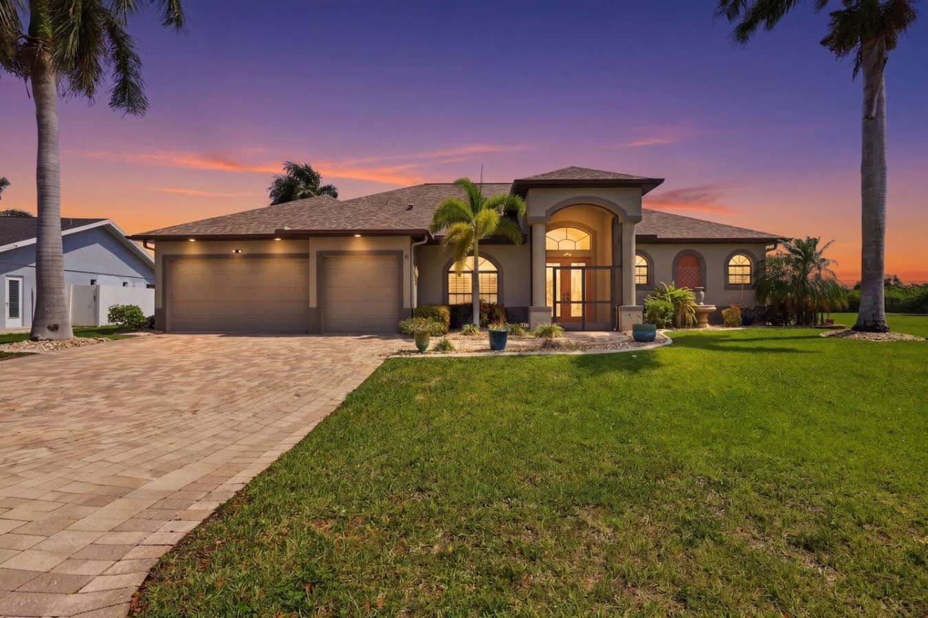Beautiful waterfront home with stunning sunset views and spacious outdoor areas.