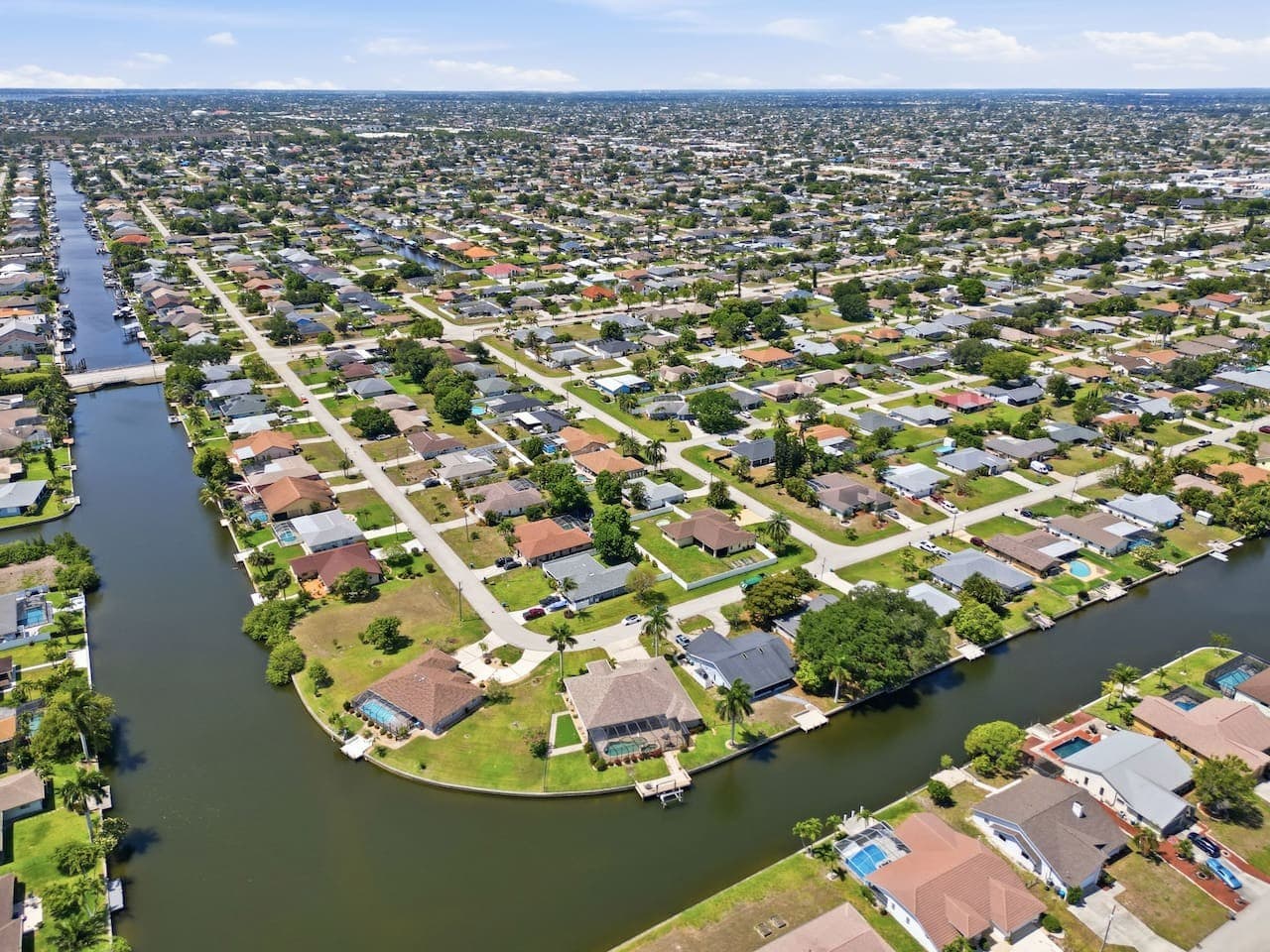 Expansive aerial views of the canal community and nearby waterways.