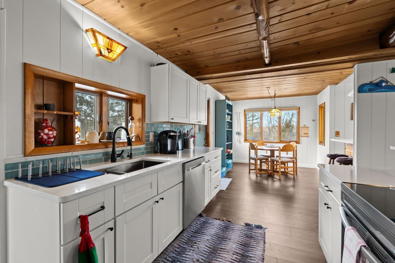 Spacious kitchen with plenty of counter space and natural light.