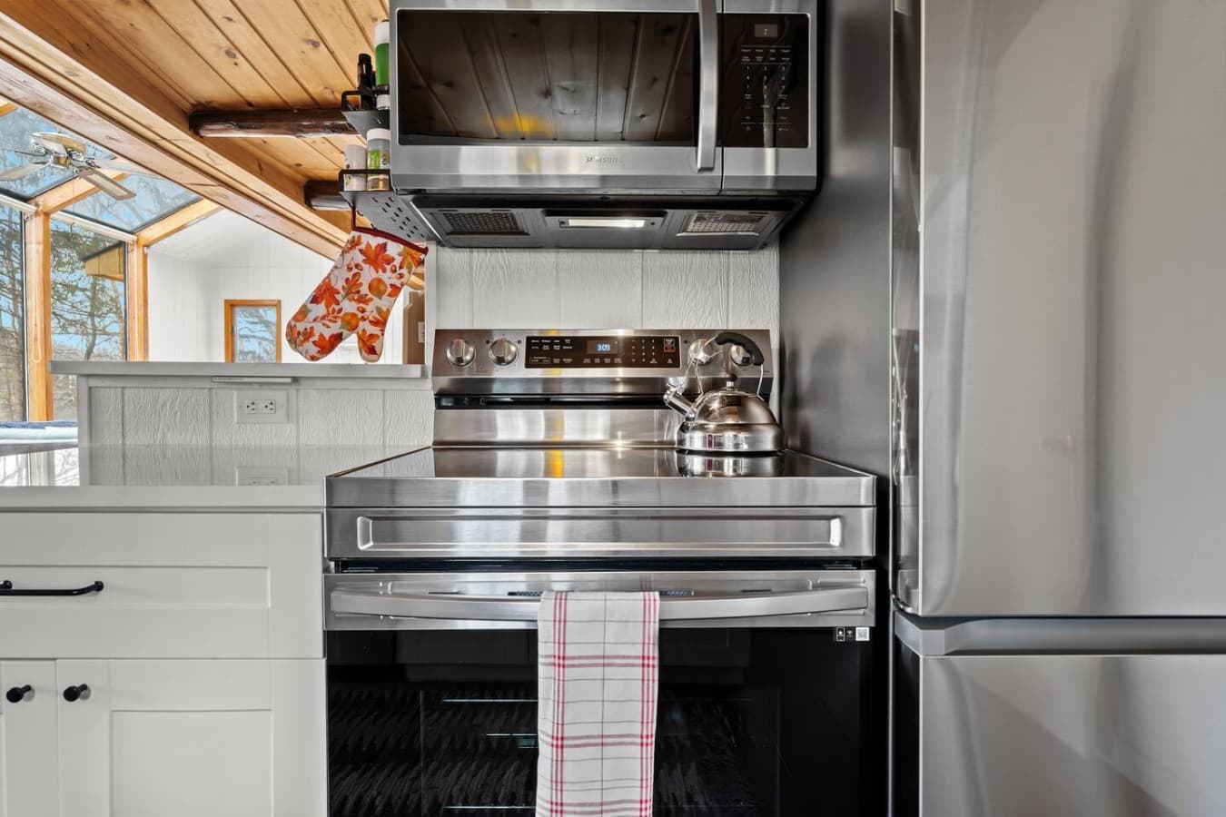 Stainless steel oven and microwave for easy meal prep.