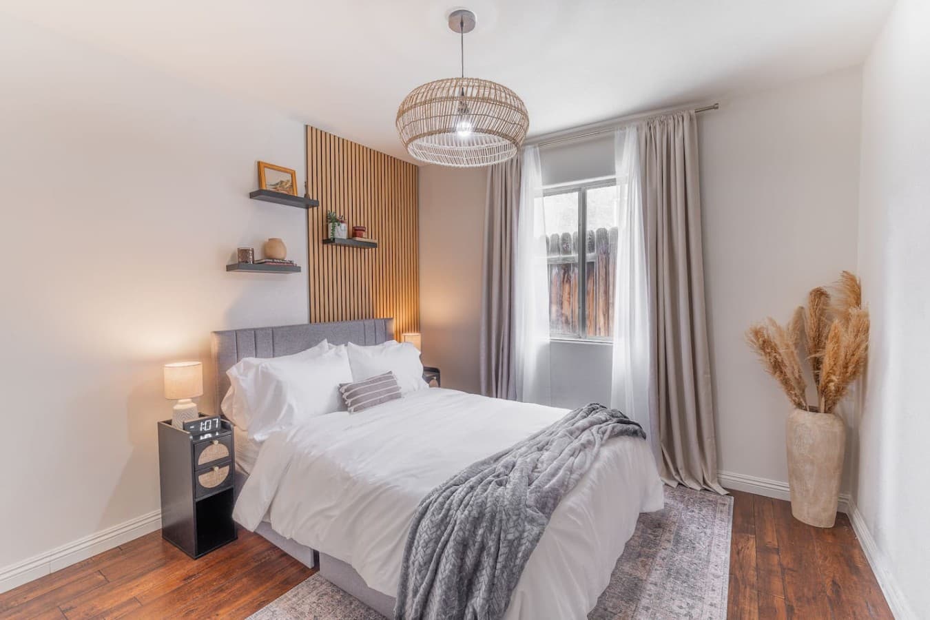 Cozy bedroom retreat with warm lighting and thoughtfully designed decor.