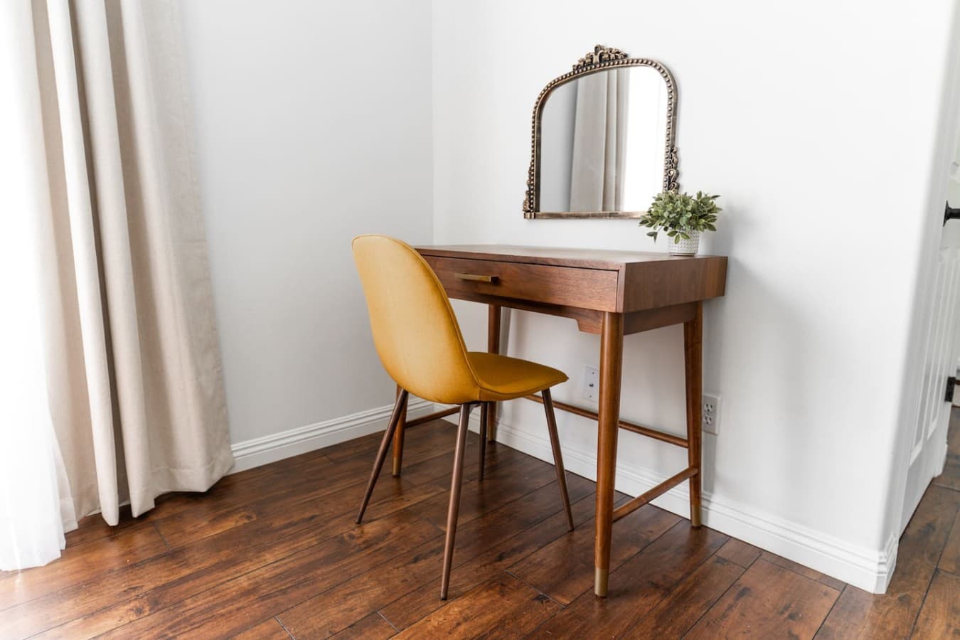 Dedicated vanity space perfect for getting ready or working remotely.
