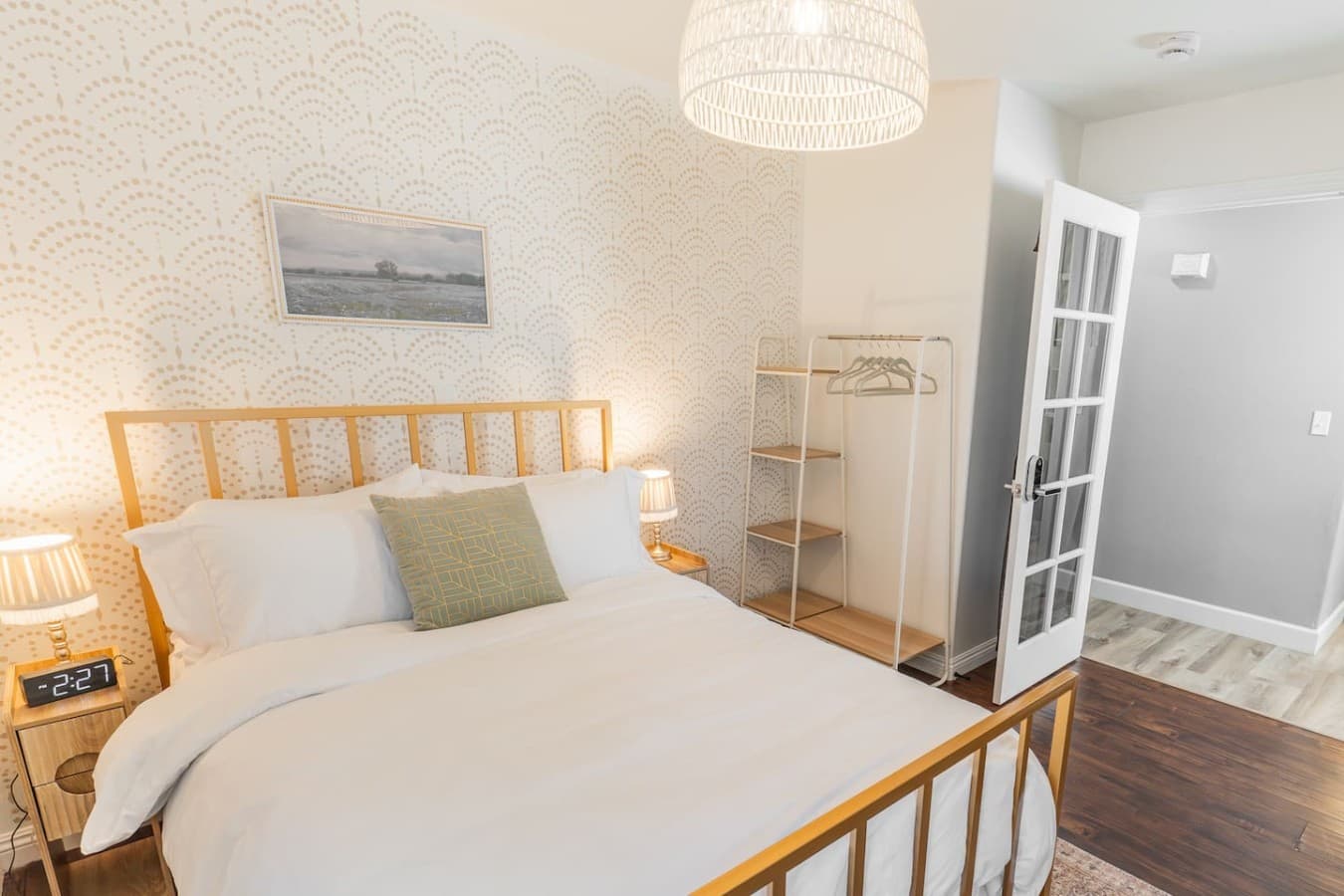 Bright and inviting bedroom with elegant touches and cozy furnishings.